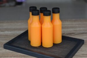 orange juice plastic bottle bottle yellow orange product 1615018 pxhere.com